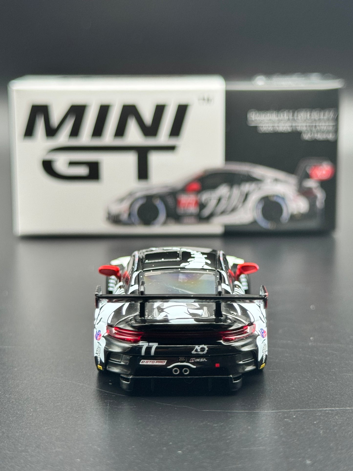 Porsche 911 GT3 R #77 AO Racing - 2023 IMSA Petit Le Mans - MINI GT