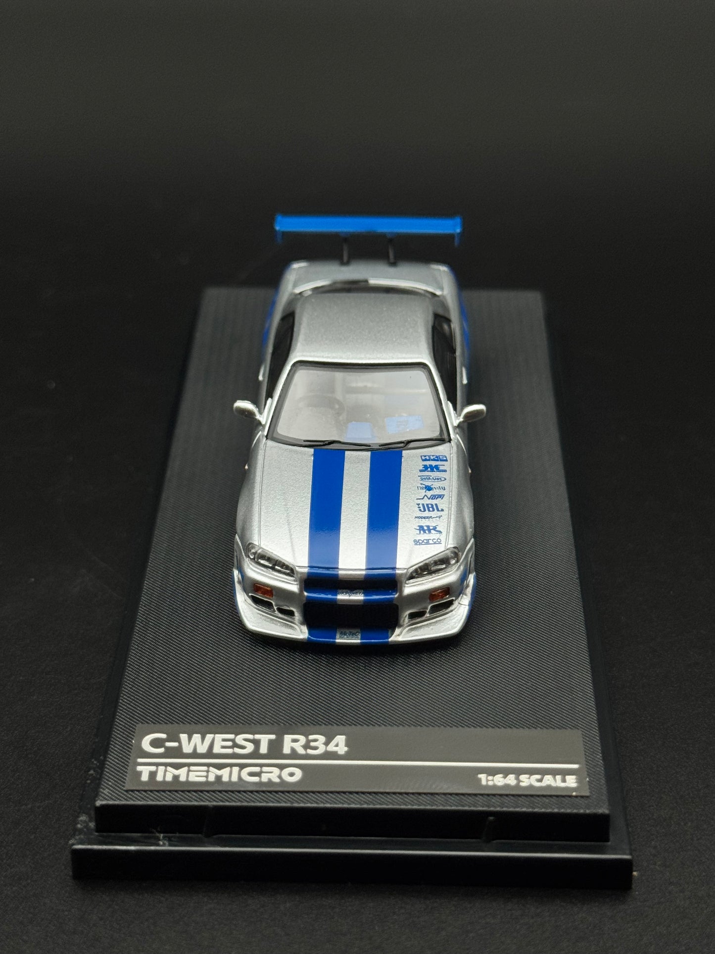 Nissan Skyline GT-R r34 C-West Time Micro | 1/64
