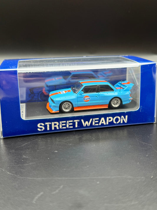 BMW LTO E30 Street Weapon “Gulf” | 1:64