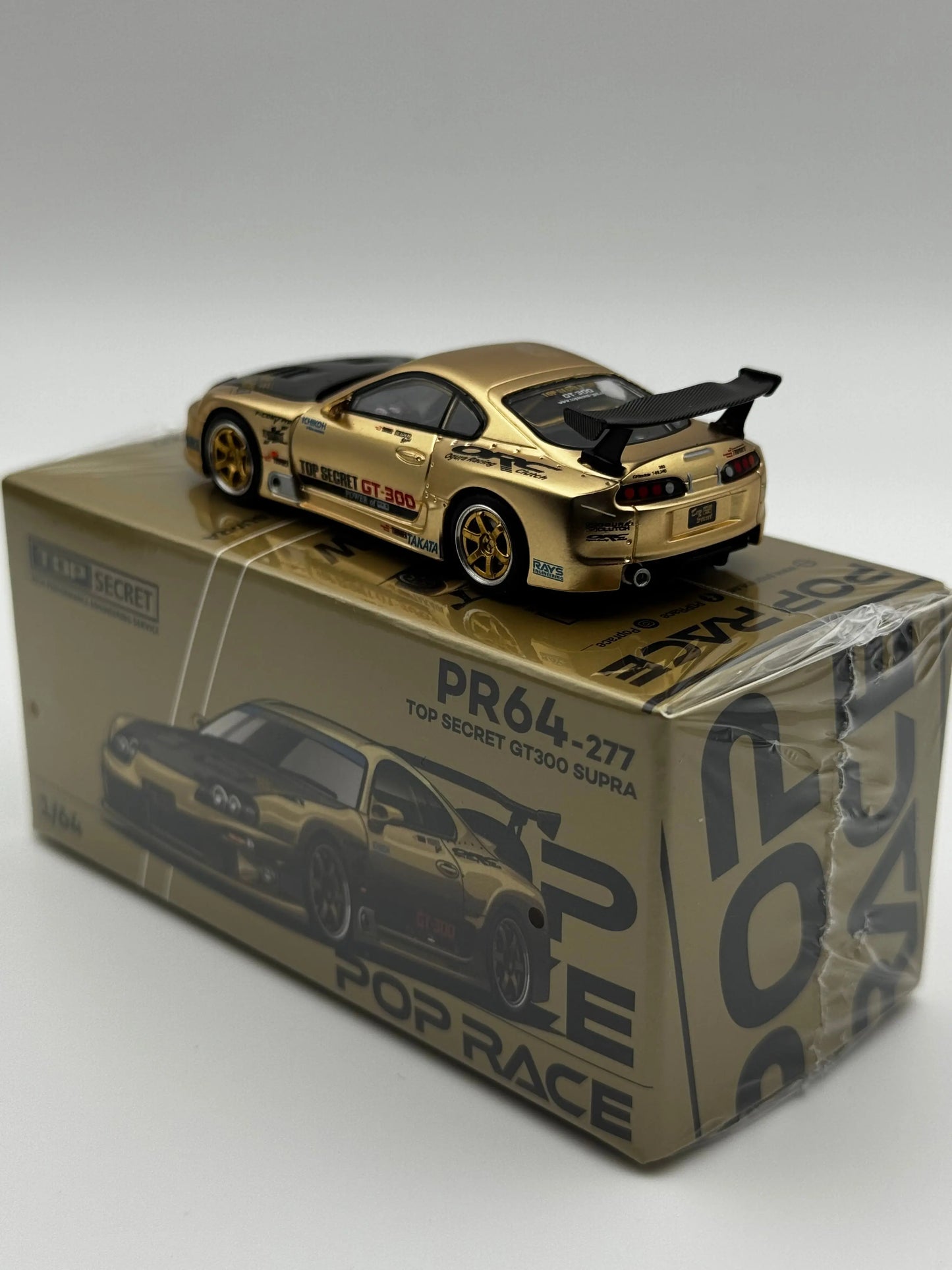 Toyota Supra Top Secret Gold – Pop Race 1:64 SVRdiecast