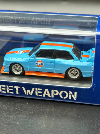 BMW LTO E30 Street Weapon “Gulf” | 1:64